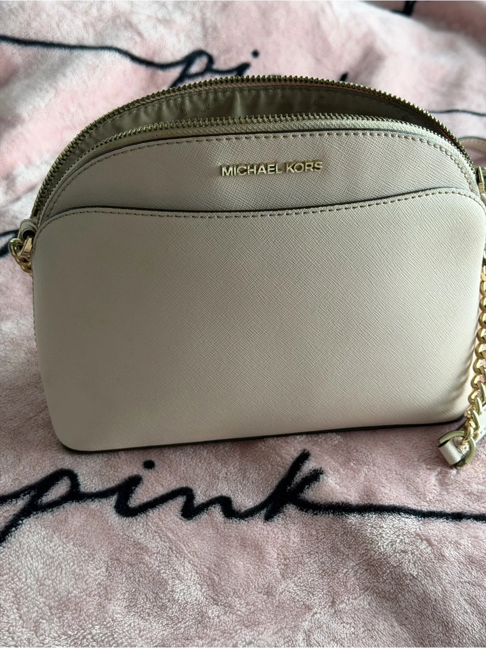 Authentic Michael Kors crossbody bag in a pink Saffiano leather